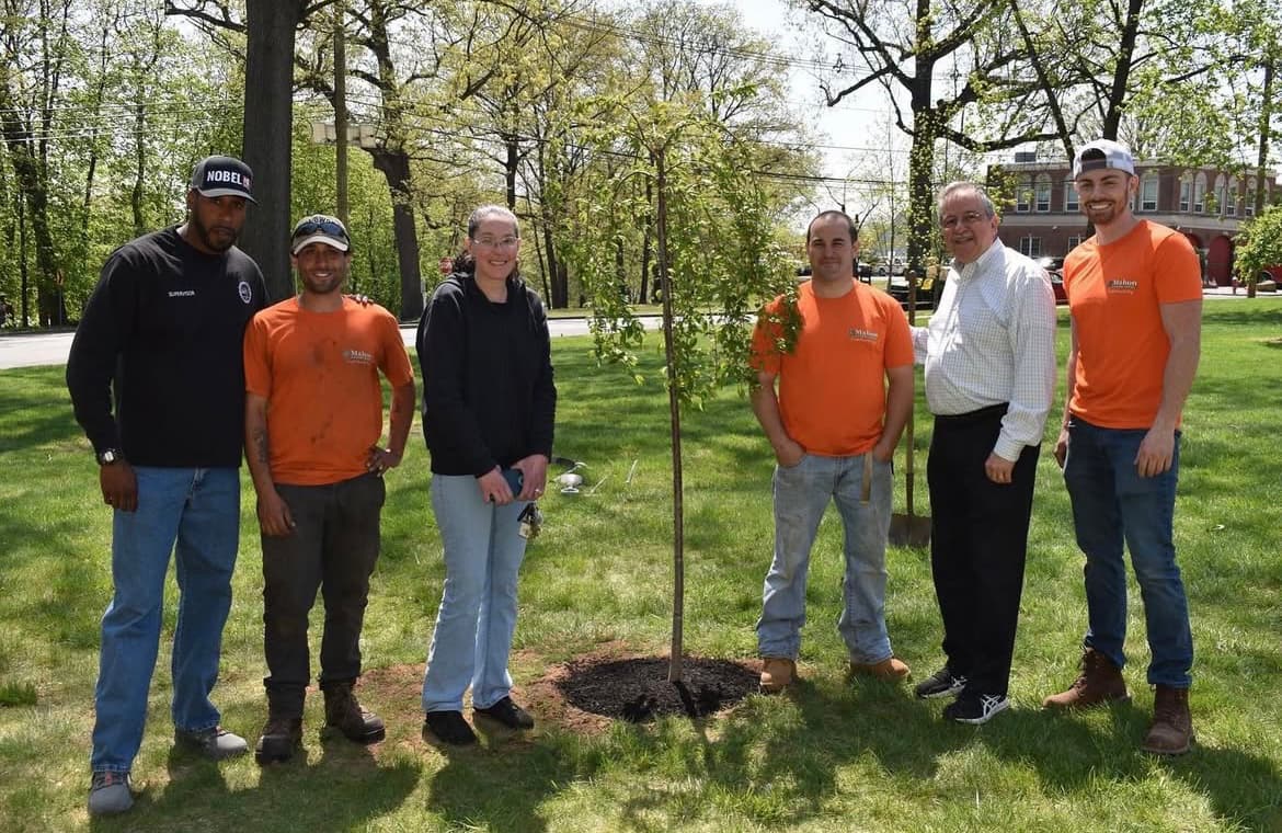 The Mahon Landscaping team gathered together